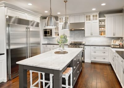 kitchen in luxury home with a dark walnut floor