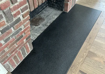 angled view black stone hearth wood floor lakeland shores mn