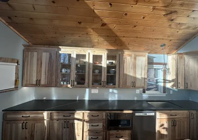 black stone kitchen countertops wood ceiling birchwood village mn