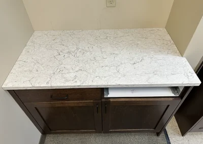 breakroom cabinet with white stone countertop lexington mn