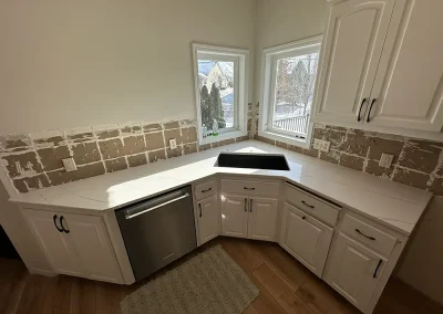 corner kitchen sink white stone countertops st marys point