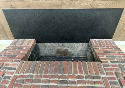 custom black stone hearth for brick fireplace lakeland shores