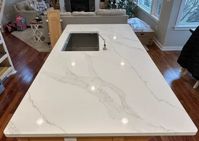 kitchen island white stone countertop view trimbelle wi