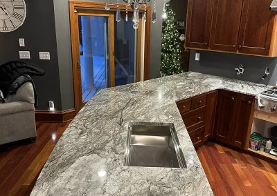 large kitchen island with grey veined stone baxter wi