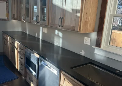 modern rustic kitchen black stone counters birchwood village
