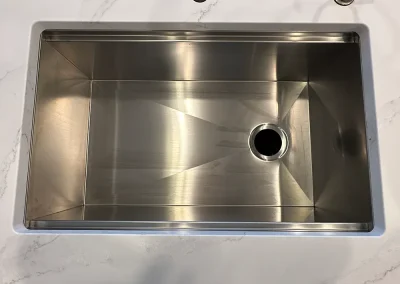 stainless steel undermount sink in white stone trimbelle wi