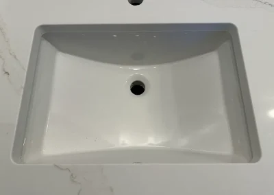 white ceramic undermount sink in stone countertop viking