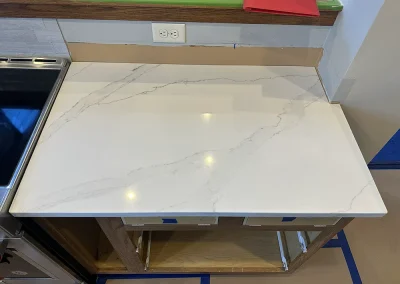 white stone kitchen countertop next to stove wildwood wi