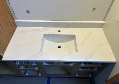 white stone vanity top with backsplash viking wi